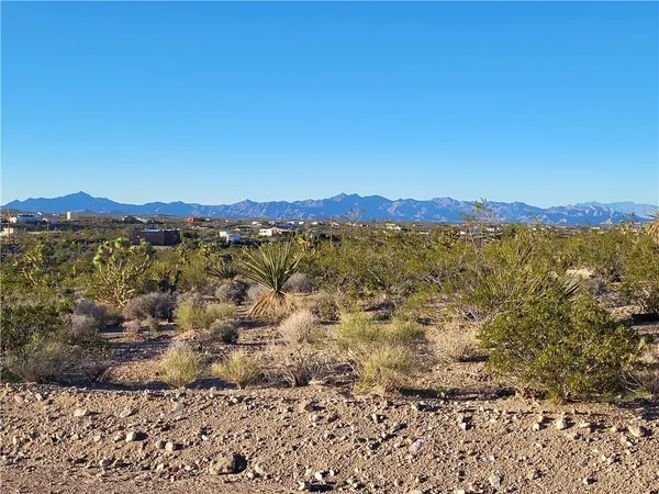 a view of an outdoor space with mountain view