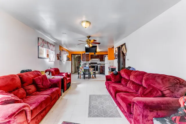 a living room with furniture and a couch