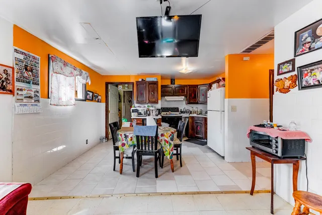 a view of a dining room with furniture