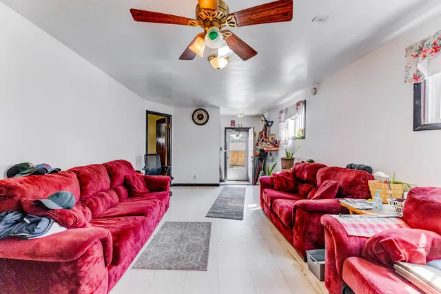 a living room with furniture and a couch