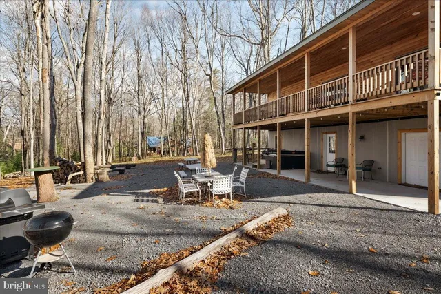 a view of a backyard of the house