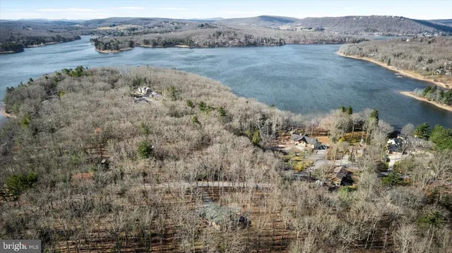 a picture of a bathroom with a shower and a mirror