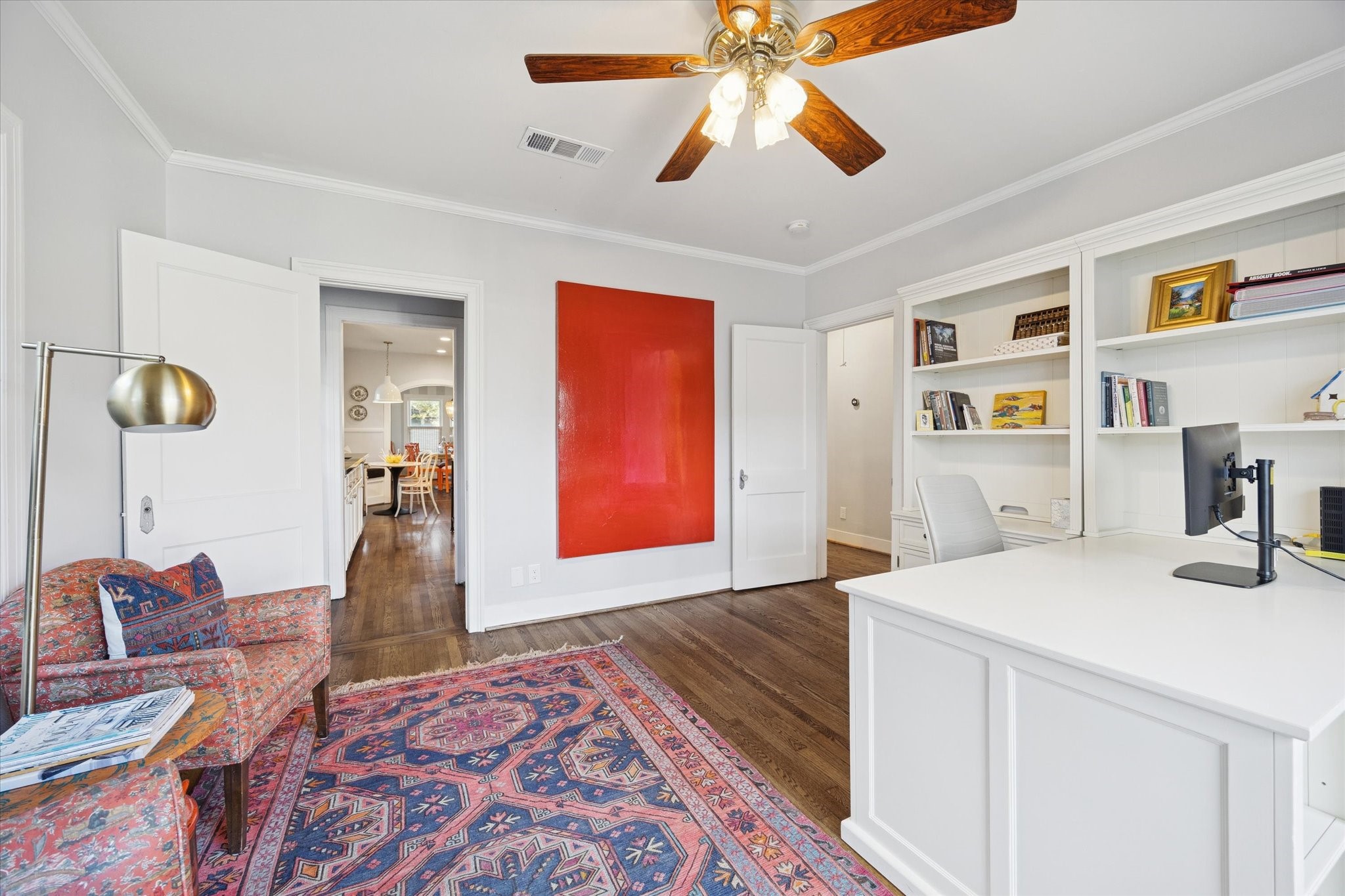 2109 Colquitt Street Houston, TX 77098 - Photo 23 of 28 a living room with furniture and wooden floor