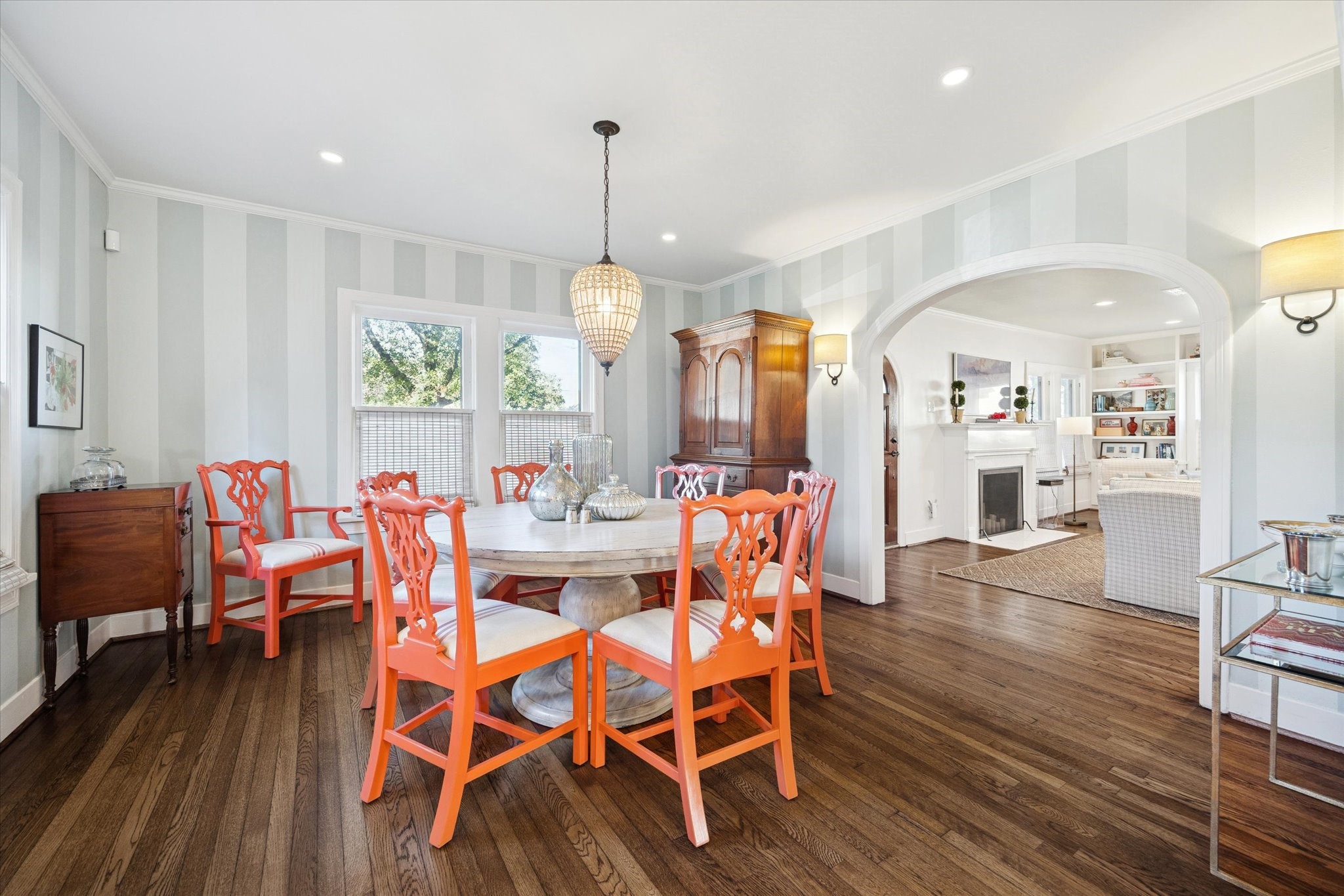 2109 Colquitt Street Houston, TX 77098 - Photo 8 of 28 a view of a dining room with furniture window and wooden floor