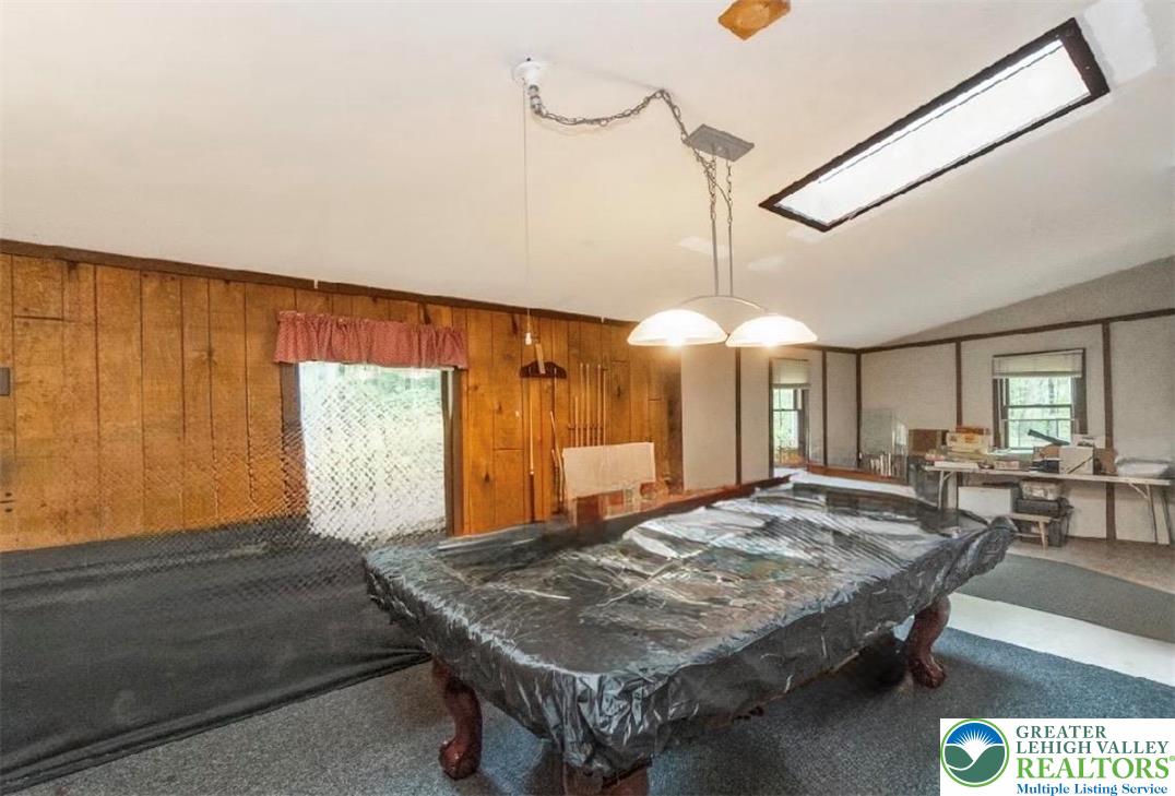 9223 North Loop Road Slatington, PA 18080 - Photo 46 of 60 a bed room with a bed and window
