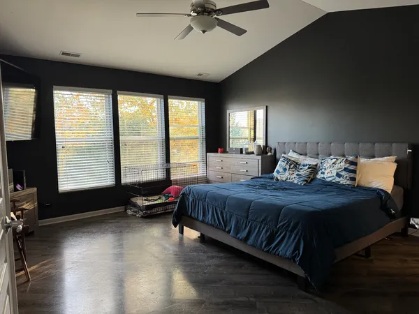 a bed room with a bed and a couch