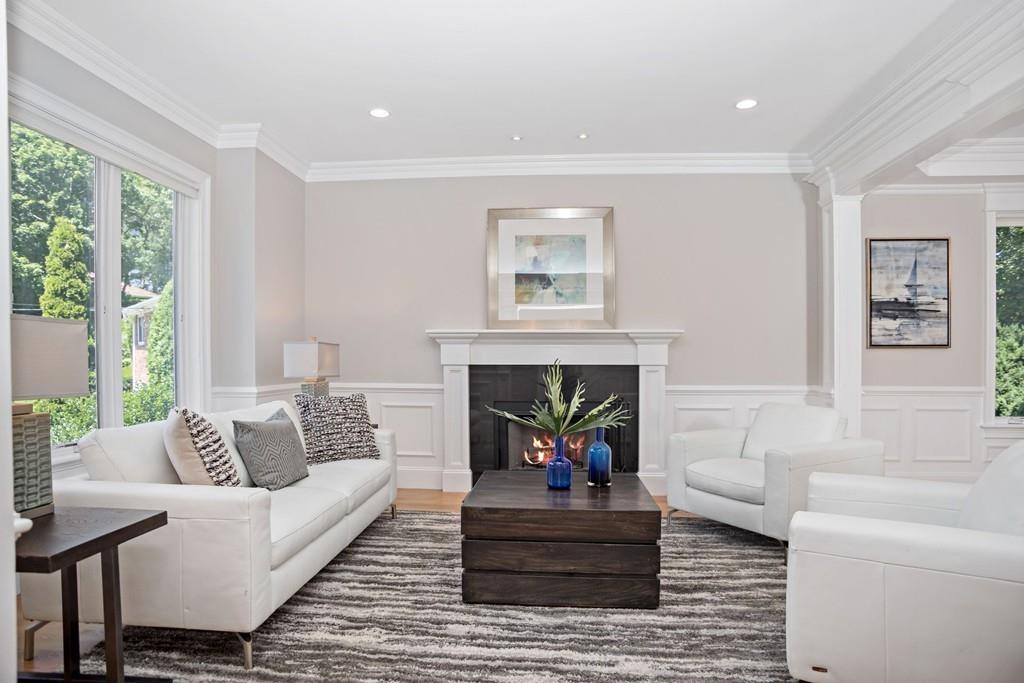 34 Dorothy Road Newton, MA 02459 - Photo 16 of 41 a living room with furniture and a fireplace