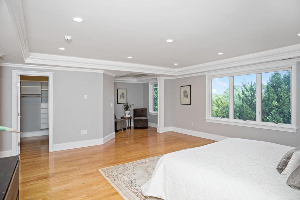 34 Dorothy Road Newton, MA 02459 - Photo 27 of 41 a spacious bedroom with a large bed and a large window