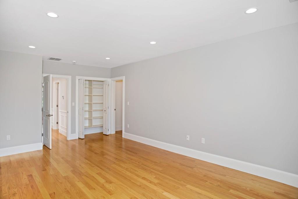 34 Dorothy Road Newton, MA 02459 - Photo 33 of 41 a view of empty room with wooden floor