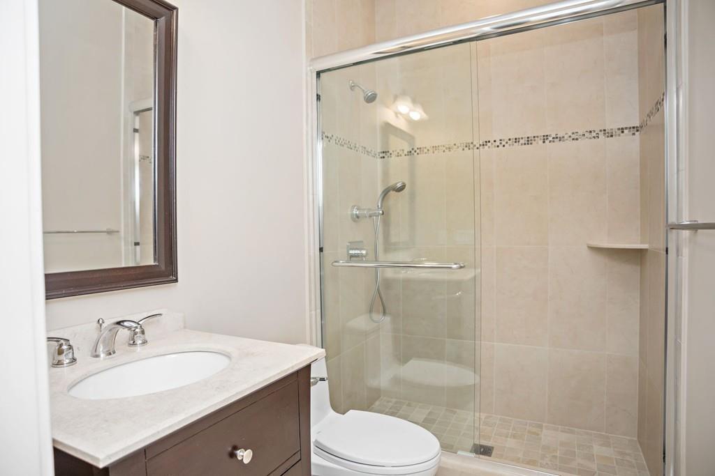 34 Dorothy Road Newton, MA 02459 - Photo 34 of 41 a bathroom with a granite countertop sink toilet and shower