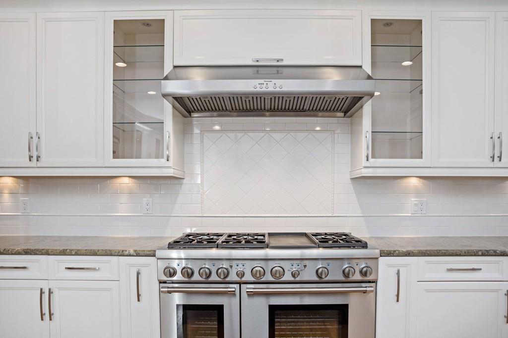 34 Dorothy Road Newton, MA 02459 - Photo 10 of 41 a stove top oven sitting inside of a kitchen