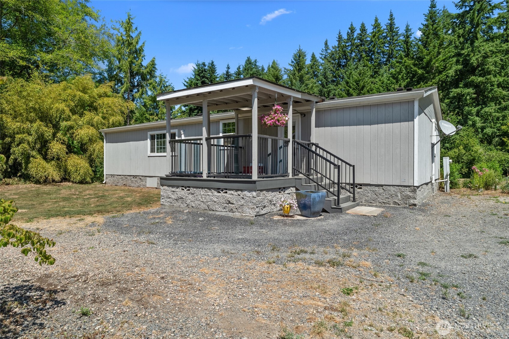 19619 Michigan Hill Road Southwest Rochester, WA 98579 - Photo 17 of 40 a view of a house with a yard
