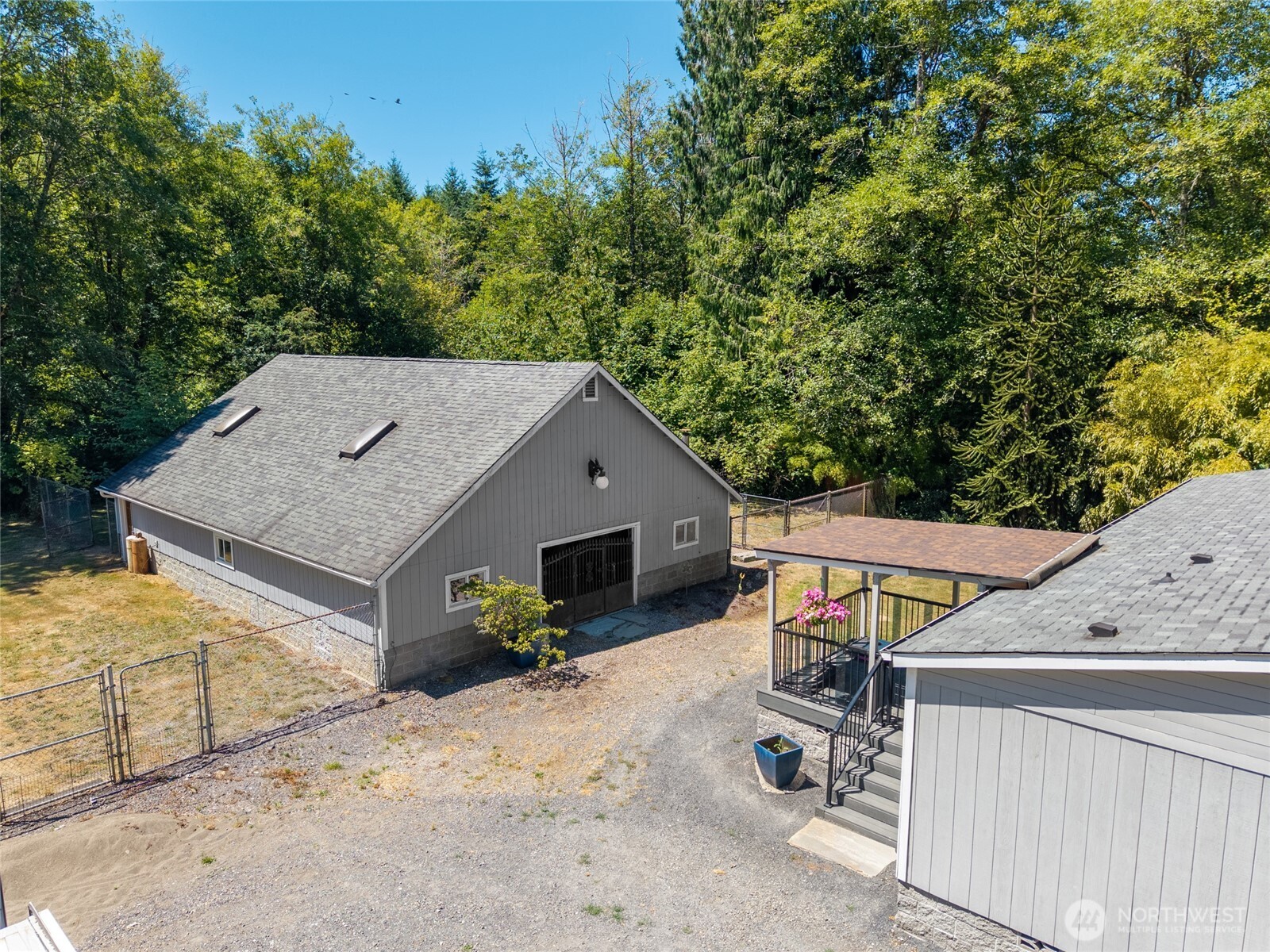 19619 Michigan Hill Road Southwest Rochester, WA 98579 - Photo 2 of 40 an aerial view of a house with a yard