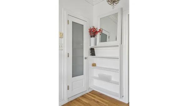 a kitchen with a refrigerator and a sink
