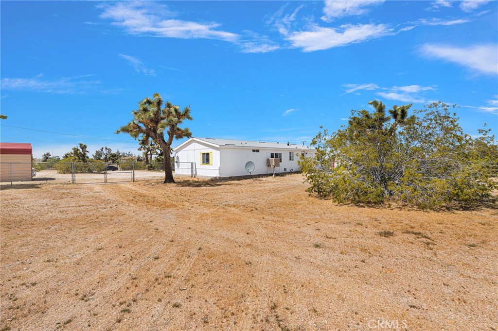 12837 Hacienda Road Phelan, CA 92371 - Photo 37 of 51 a view of a yard