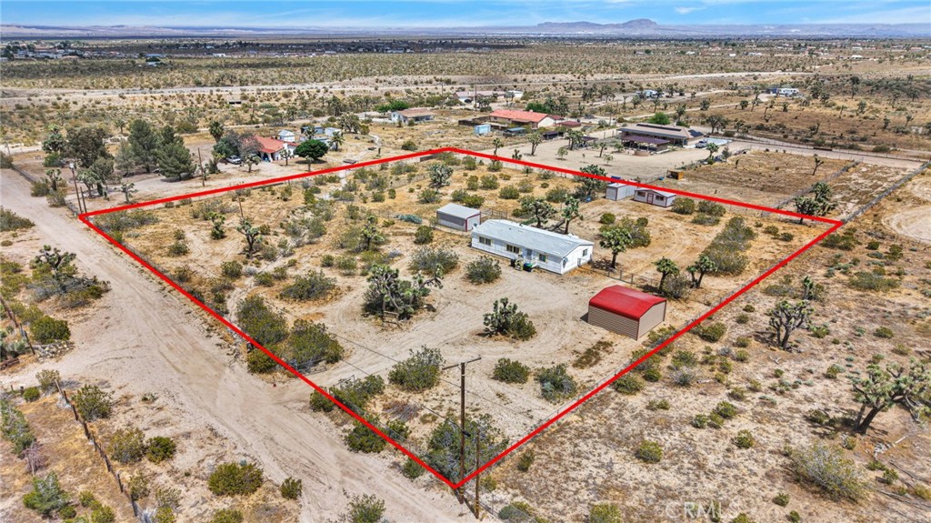 12837 Hacienda Road Phelan, CA 92371 - Photo 48 of 51 an aerial view of a house