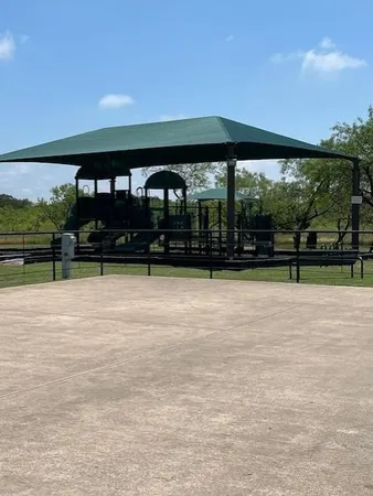 a view of a lake with houses in the back