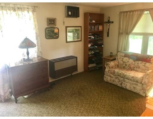 64 State Road Whately, MA 01373 - Photo 25 of 29 a living room with furniture and a window
