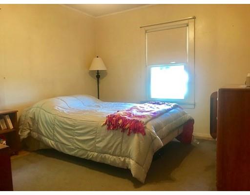 64 State Road Whately, MA 01373 - Photo 27 of 29 a bedroom with a bed and a window