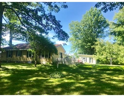 64 State Road Whately, MA 01373 - Photo 7 of 29 a view of a house with a big yard
