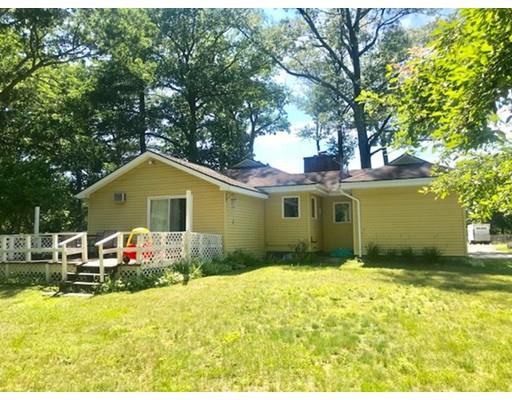 64 State Road Whately, MA 01373 - Photo 8 of 29 a front view of house with yard and trees in the background