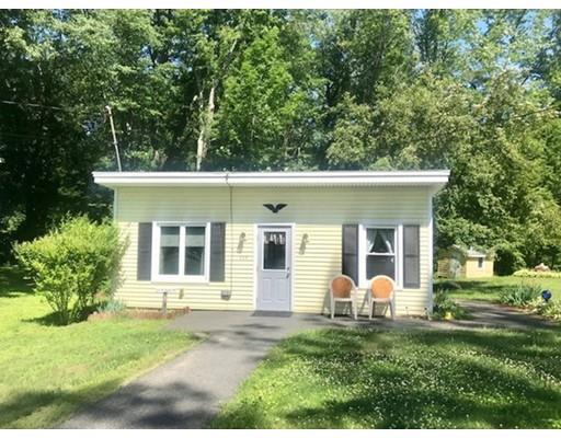 64 State Road Whately, MA 01373 - Photo 10 of 29 a view of a house with backyard and porch