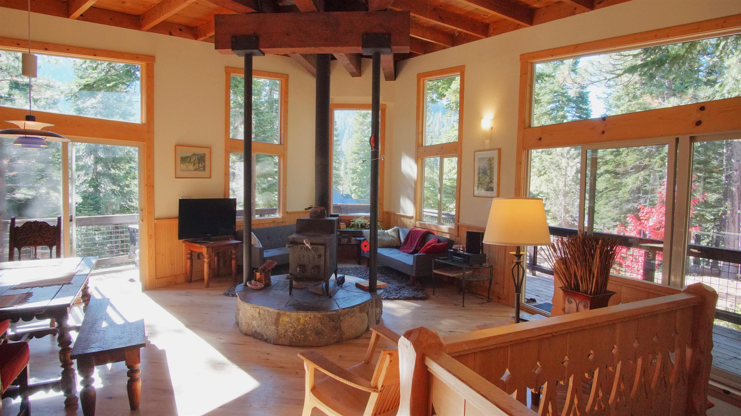 1557 Alpine Meadows Road Alpine Meadows, CA 96146 - Photo 13 of 28 a living room with furniture and a large window