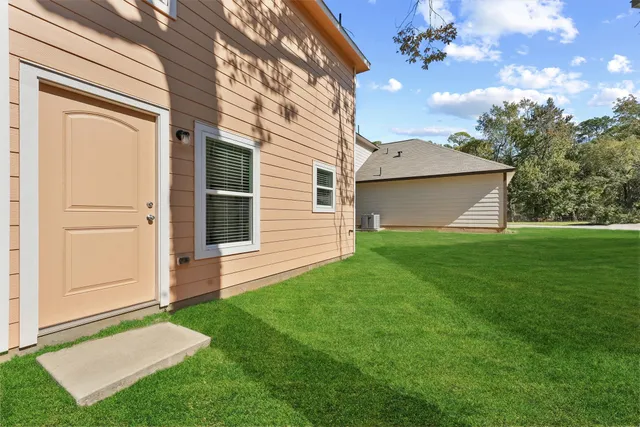 a view of a backyard with a garden