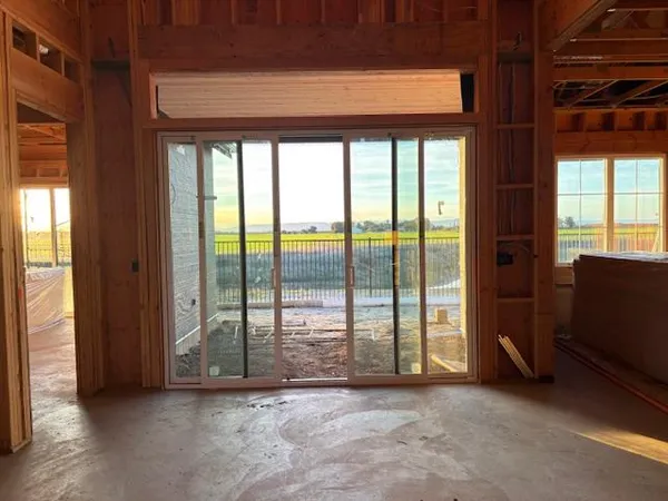a view of a room with a large window