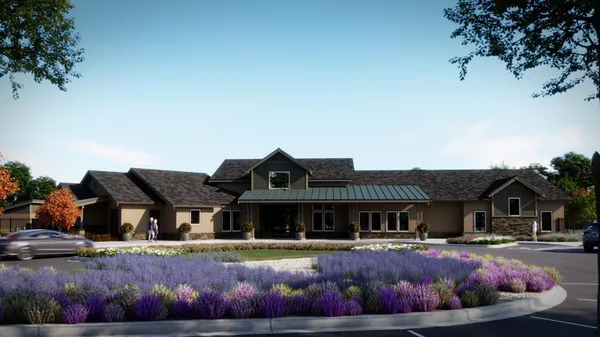 a front view of house with outdoor seating