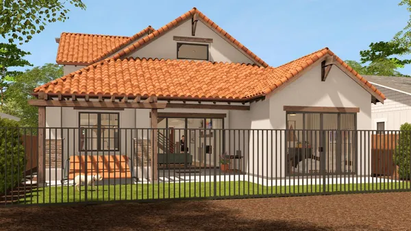 a view of a white house with a small yard and plants