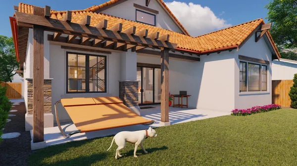 a backyard of a house with table and chairs