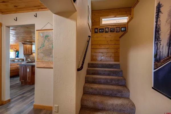 a living room with furniture and windows