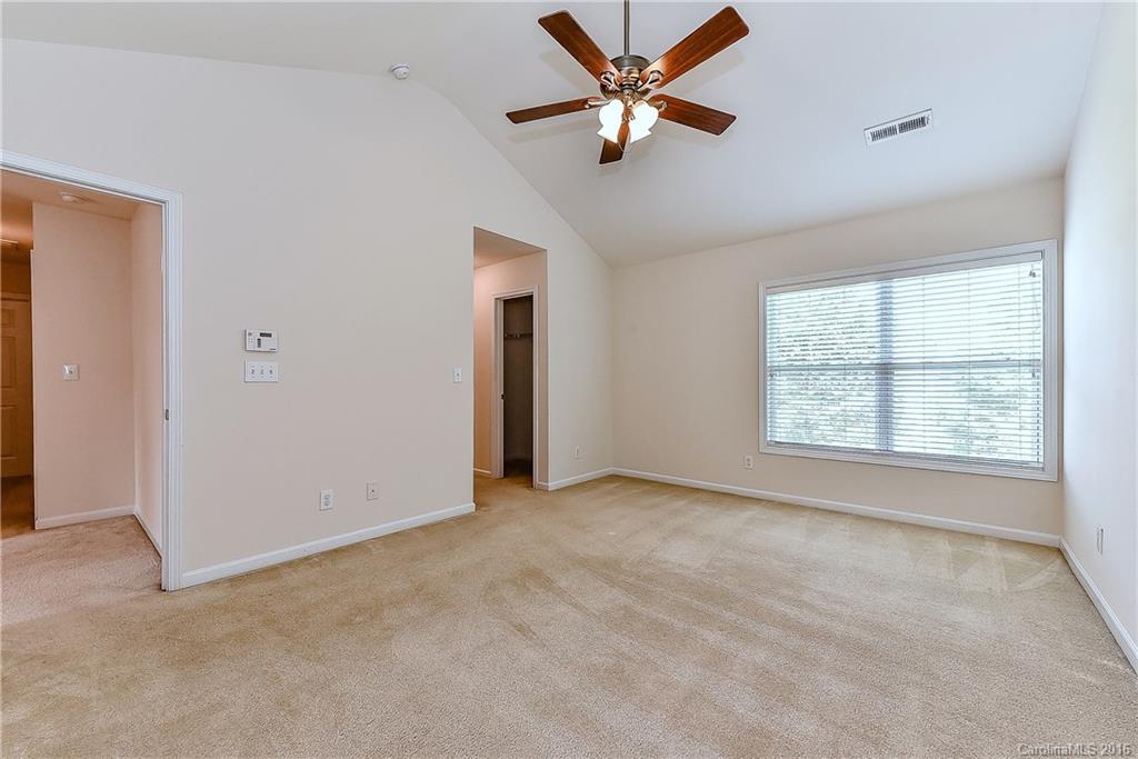 3111 Gloxinia Road Charlotte, NC 28215 - Photo 16 of 24 a view of an empty room with a window