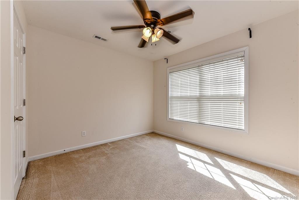 3111 Gloxinia Road Charlotte, NC 28215 - Photo 19 of 24 a view of an empty room with a window
