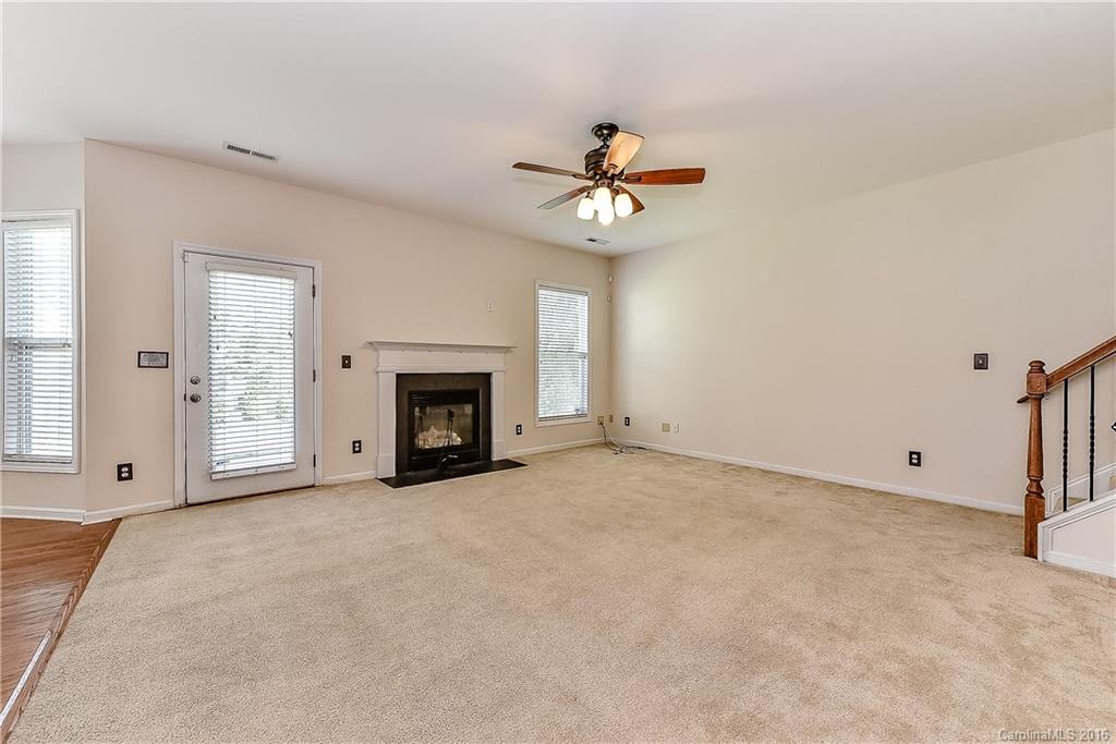 3111 Gloxinia Road Charlotte, NC 28215 - Photo 7 of 24 a view of empty room with a fireplace