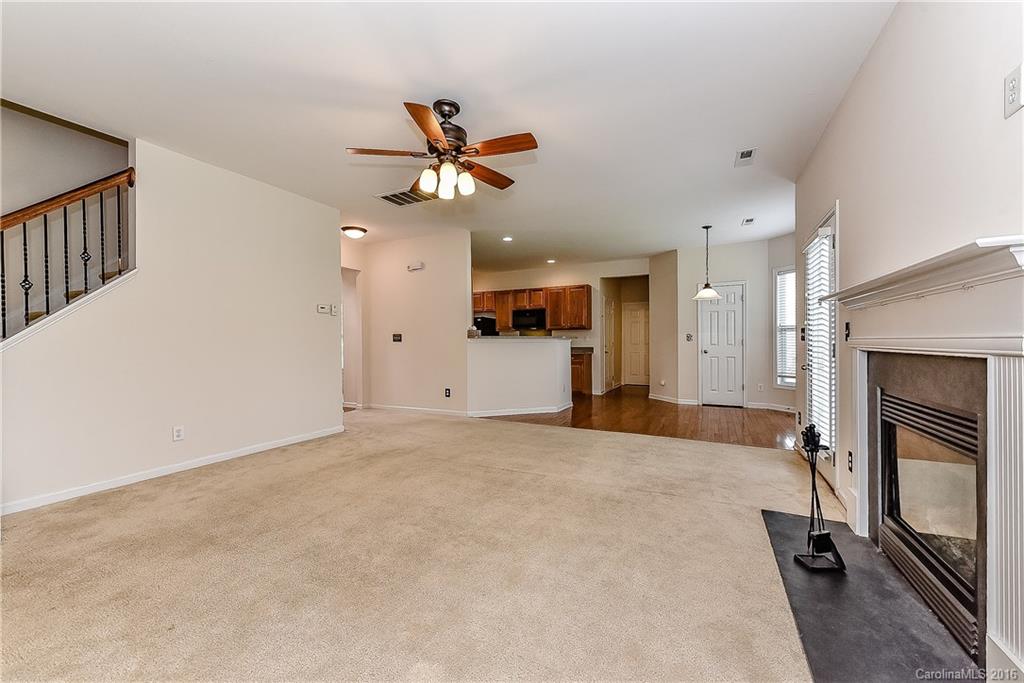 3111 Gloxinia Road Charlotte, NC 28215 - Photo 9 of 24 a view of an empty room with a fireplace