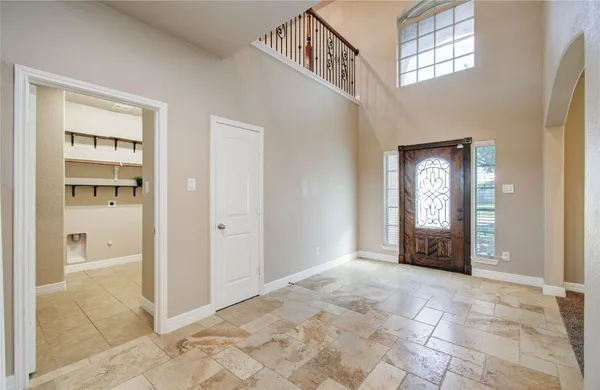 a kitchen with stainless steel appliances granite countertop a stove and a sink