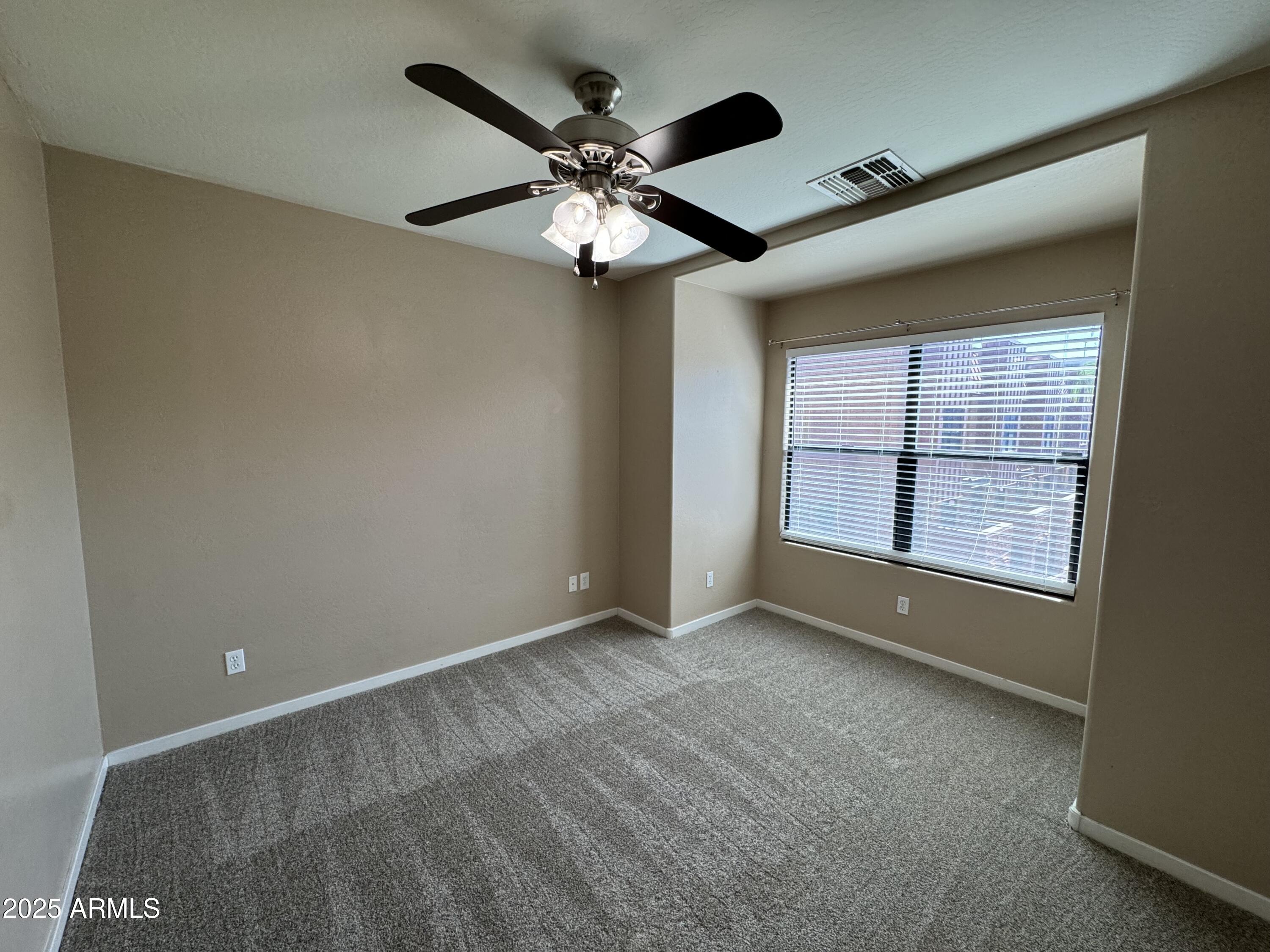 305 South Wilson Street, Unit 111 Tempe, AZ 85281 - Photo 27 of 48 a view of an empty room with a window