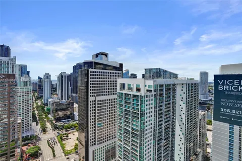 a view of a city with tall buildings