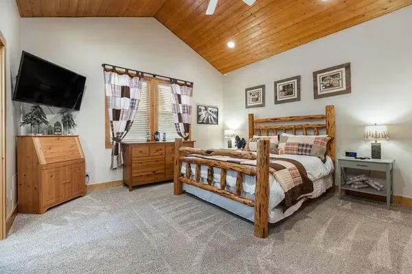 a living room with furniture and a bath tub