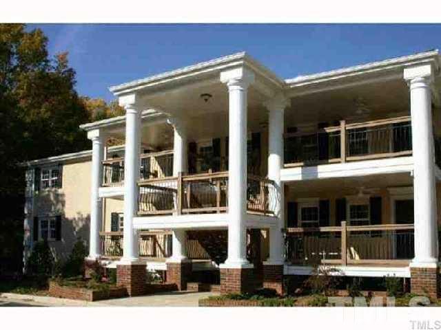 720 Bilyeu Street, Unit 304 Raleigh, NC 27606 - Photo 1 of 10 a front view of a building with a garden