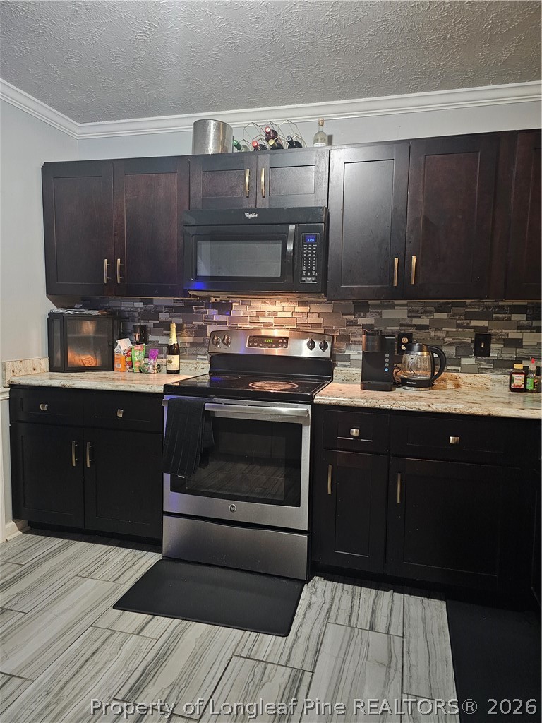 7490 Fairpoint Road Fayetteville, NC 28314 - Photo 5 of 9 a kitchen with a sink and cabinets