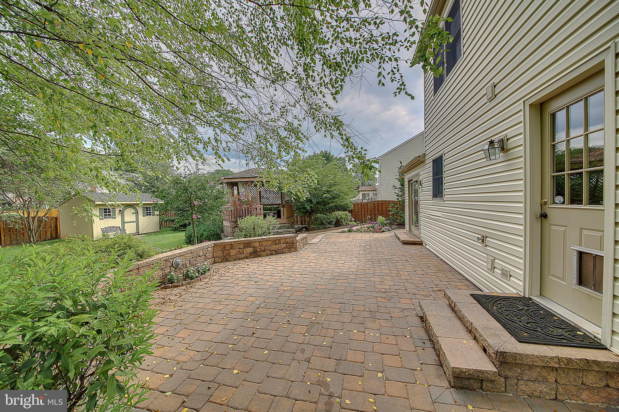 305 Newgate Road Langhorne, PA 19047 - Photo 31 of 37 Back Paver Patio