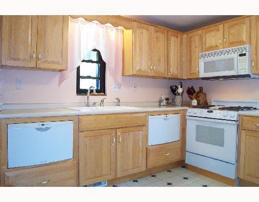 47 Herbst Road Coraopolis, PA 15108 - Photo 4 of 8 Kitchen. 11x11 kitchen with newer natural maple Kraftmaid cabinets with Kohler sink and faucet.