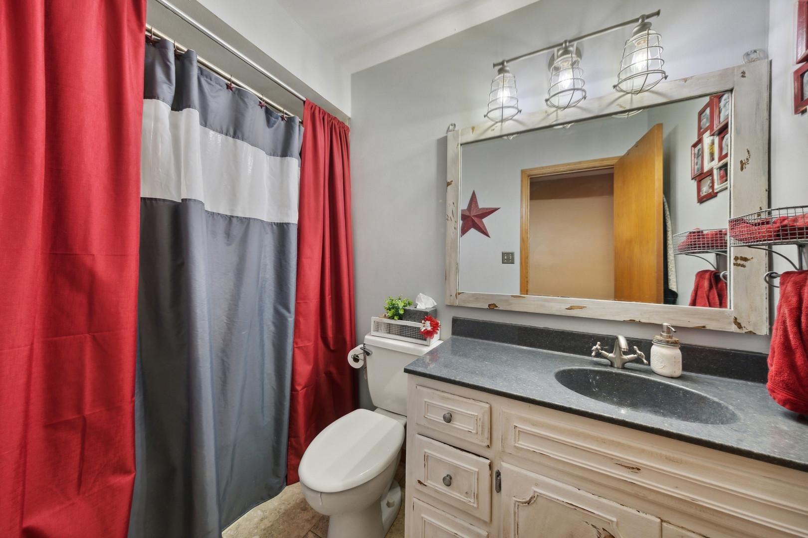 1040 North Cedar Road New Lenox, IL 60451 - Photo 24 of 37 a bathroom with a sink a toilet and a mirror