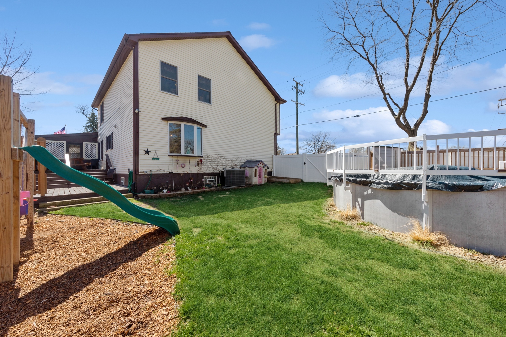 1040 North Cedar Road New Lenox, IL 60451 - Photo 29 of 37 a view of a house with a yard