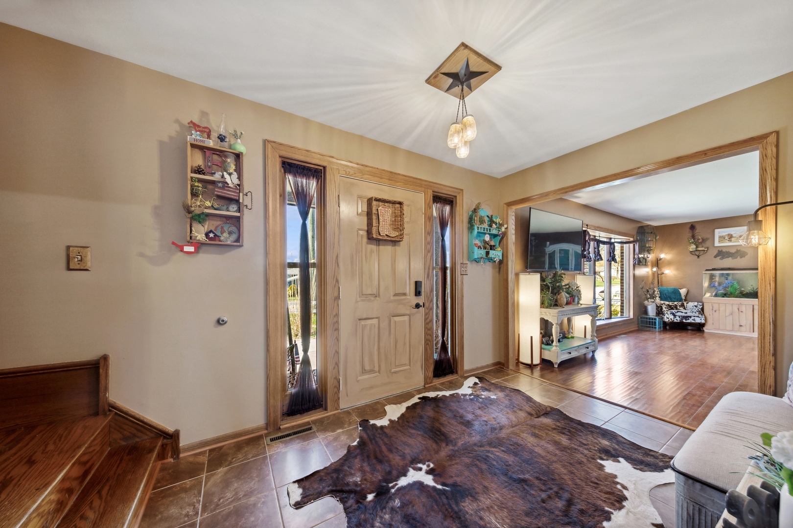1040 North Cedar Road New Lenox, IL 60451 - Photo 4 of 37 a living room with furniture and a wooden floor