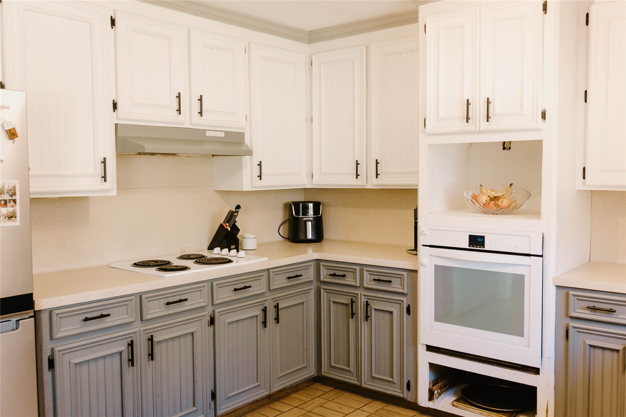 16120 Hartman Road Magnolia, TX 77355 - Photo 13 of 41 a kitchen with stainless steel appliances granite countertop a sink and cabinets with wooden floor
