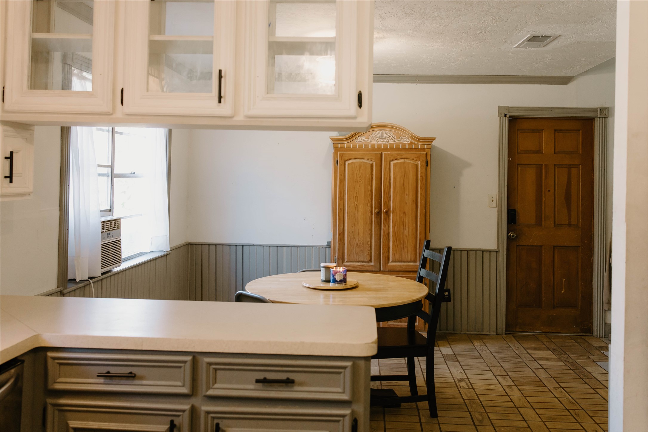 16120 Hartman Road Magnolia, TX 77355 - Photo 15 of 41 a dining table with chairs and mirror
